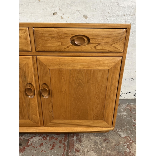 113 - An Ercol Windsor blonde elm sideboard - approx. 69cm high x 91cm wide x 43cm deep