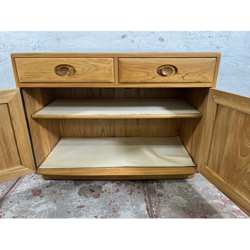 113 - An Ercol Windsor blonde elm sideboard - approx. 69cm high x 91cm wide x 43cm deep