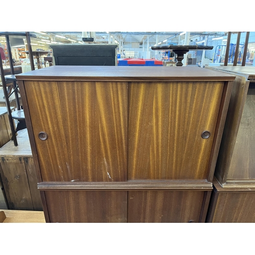 117 - Six mid 20th century teak wall hanging cabinets - each approx. 44cm high x 70cm wide x 38cm deep