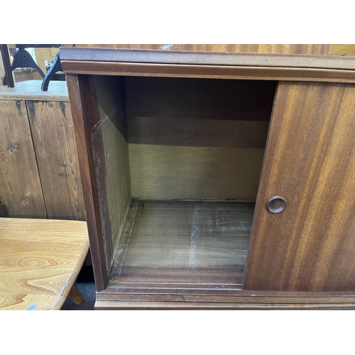 117 - Six mid 20th century teak wall hanging cabinets - each approx. 44cm high x 70cm wide x 38cm deep