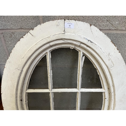 12 - An antique white painted pine framed oval window - approx. 104cm high x 72cm wide