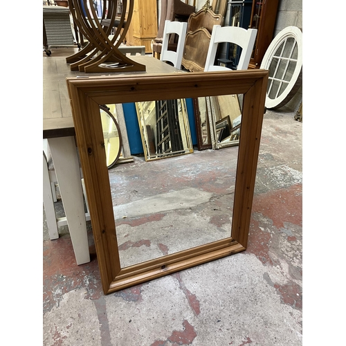 15 - Two pine framed wall mirrors - approx. 96cm high x 79cm wide