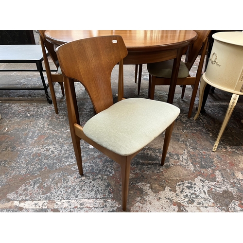 24 - A mid 20th century Elliotts of Newbury (EON) teak circular extending dining table and four chairs - ... 