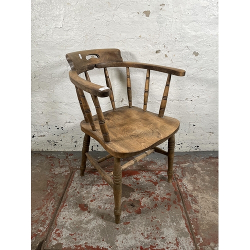 41 - A late 19th century elm and beech smoker's bow chair - approx. 82cm high x 54cm wide x 46cm deep