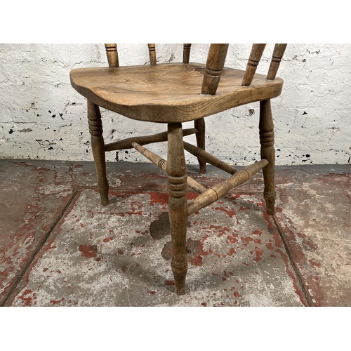 41 - A late 19th century elm and beech smoker's bow chair - approx. 82cm high x 54cm wide x 46cm deep