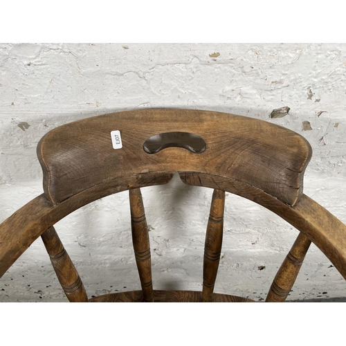 41 - A late 19th century elm and beech smoker's bow chair - approx. 82cm high x 54cm wide x 46cm deep