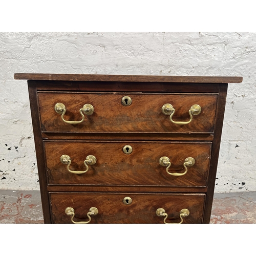46 - A 19th century mahogany miniature chest of drawers on bracket supports - approx. 56cm high x 50cm wi... 