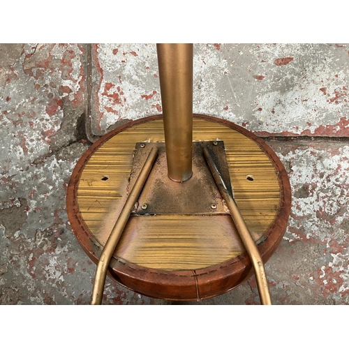 56 - A pair of mid 20th century brown vinyl and tubular metal swivel bar stools - approx. 94cm high