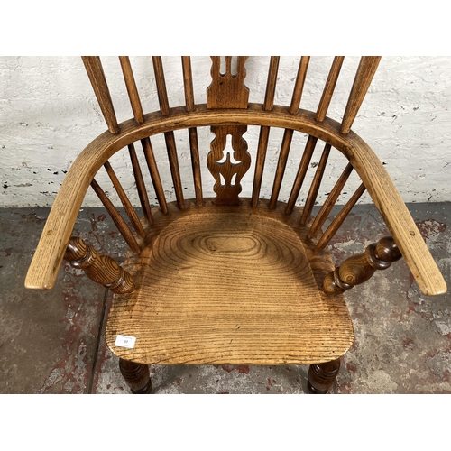 57 - A Victorian ash and elm Windsor chair - approx. 110cm high x 50cm wide x 40cm deep