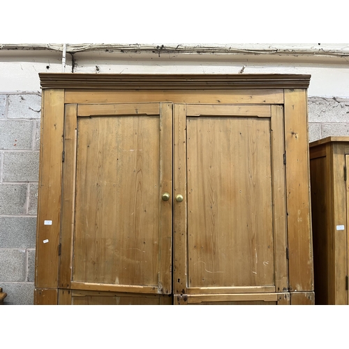 6 - A Victorian pine four door housekeeper's cupboard - approx. 218cm high x 140cm wide x 51cm deep