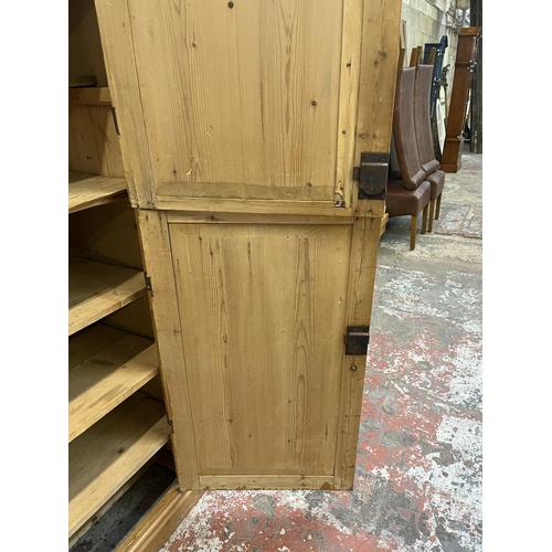 6 - A Victorian pine four door housekeeper's cupboard - approx. 218cm high x 140cm wide x 51cm deep