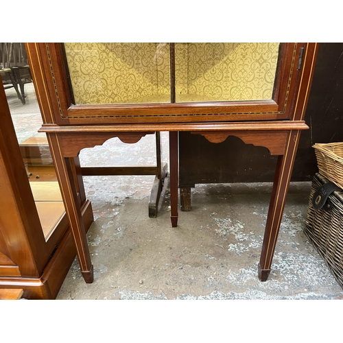 77 - An Edwardian inlaid mahogany free standing corner display cabinet with single glazed door - approx. ... 