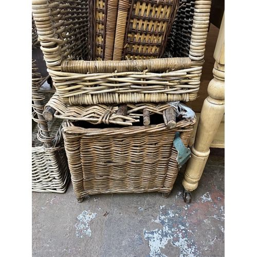 78 - A collection of wicker baskets and furniture to include bottle rack, circular side table etc.