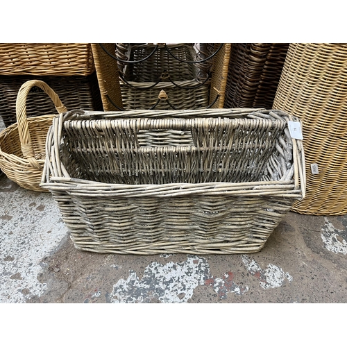 78 - A collection of wicker baskets and furniture to include bottle rack, circular side table etc.