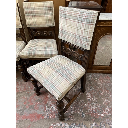 81 - Five carved oak and tartan fabric upholstered dining chairs