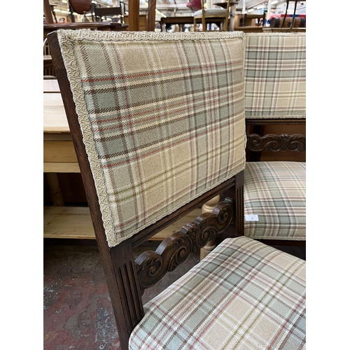 81 - Five carved oak and tartan fabric upholstered dining chairs