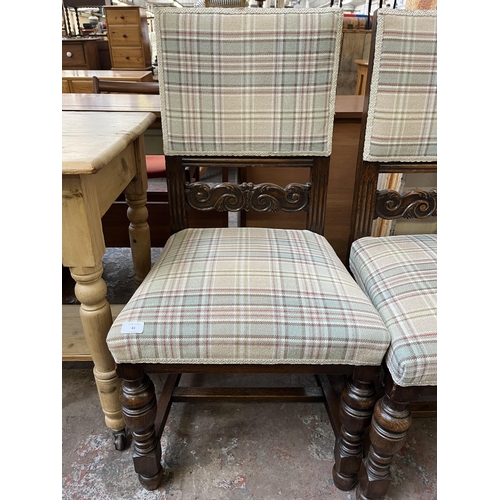 81 - Five carved oak and tartan fabric upholstered dining chairs