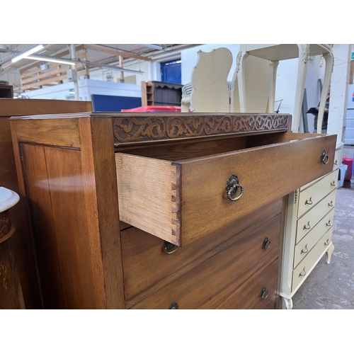 83 - An Edwardian carved mahogany chest of drawers - approx. 102cm high x 91cm wide x 45cm deep