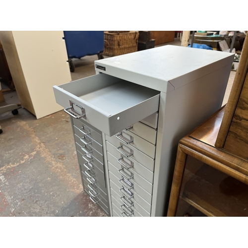 91A - A Triumph grey metal fifteen drawer office filing cabinet - approx. 87cm high x 28cm wide x 40cm dee... 