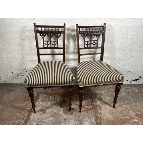 92 - A pair of late 19th century carved mahogany occasional chairs