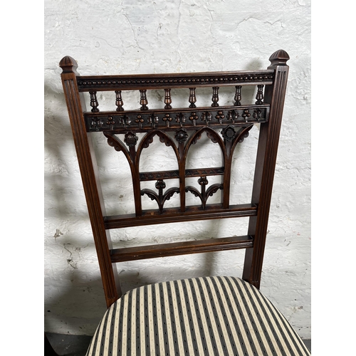 92 - A pair of late 19th century carved mahogany occasional chairs