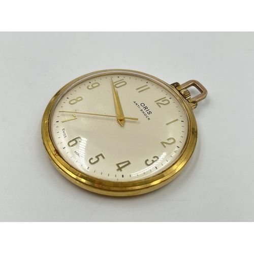 A 1970s Oris anti shock slim open face hand wind pocket watch