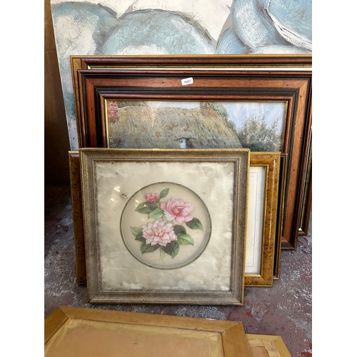 230 - A collection of framed pictures to include early 20th century oil on board of a seascape near Whitby... 