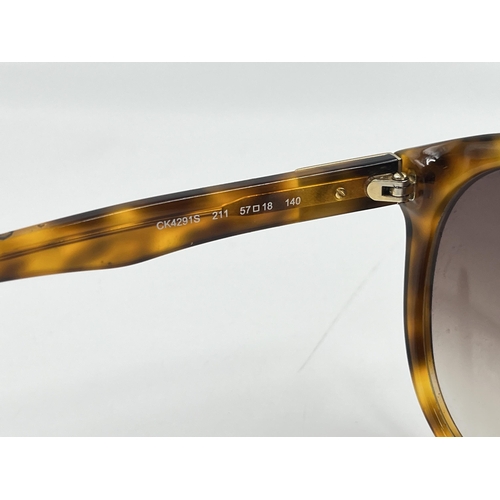 2175 - A pair of Calvin Klein tortoiseshell effect lady's sunglasses