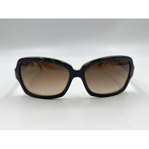 2177 - A pair of Chanel tortoiseshell effect lady's sunglasses