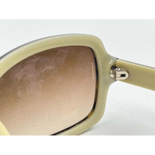 2177 - A pair of Chanel tortoiseshell effect lady's sunglasses