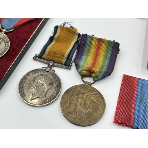 2197 - A collection of early 20th century militaria and medals awarded to Mr Cecil M. Darvill to include WW... 