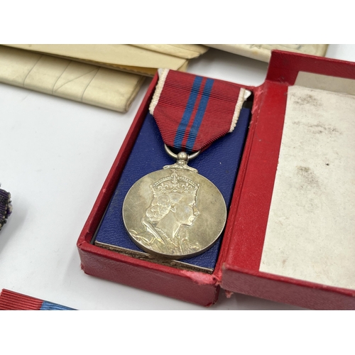 2197 - A collection of early 20th century militaria and medals awarded to Mr Cecil M. Darvill to include WW... 