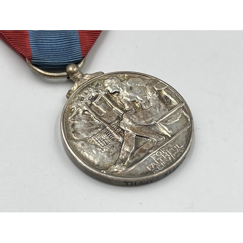 2197 - A collection of early 20th century militaria and medals awarded to Mr Cecil M. Darvill to include WW... 