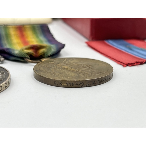 2197 - A collection of early 20th century militaria and medals awarded to Mr Cecil M. Darvill to include WW... 