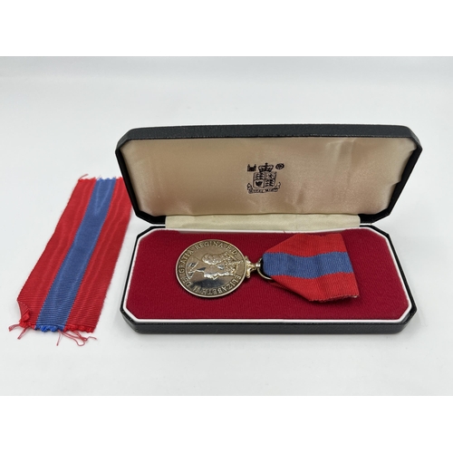 2198 - A boxed Royal Mint faithful service medal awarded to William Ernest Drummond