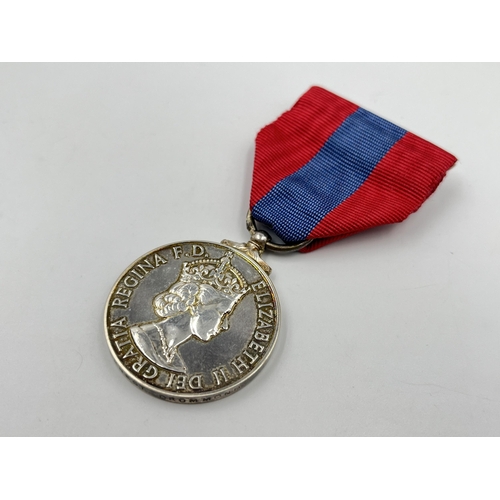 2198 - A boxed Royal Mint faithful service medal awarded to William Ernest Drummond