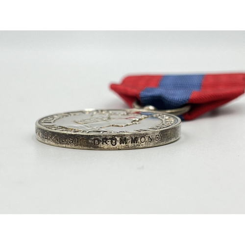 2198 - A boxed Royal Mint faithful service medal awarded to William Ernest Drummond