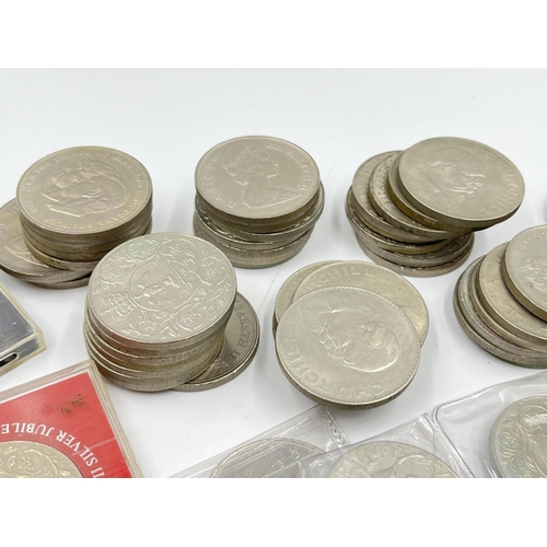 2211 - Approx. sixty-four British commemorative coins