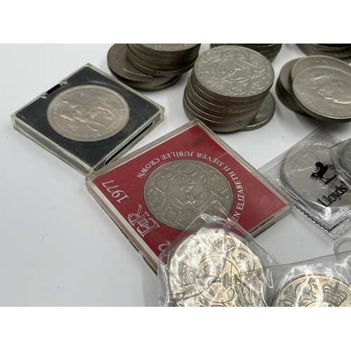 2211 - Approx. sixty-four British commemorative coins