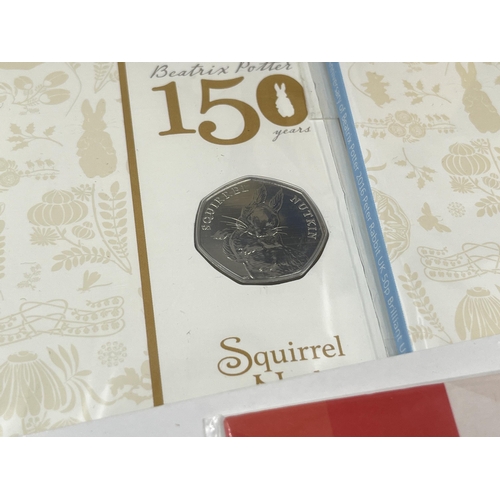 2213 - A collection of British coins to include three sealed The Royal Mint Beatrix Potter 150th Anniversar... 