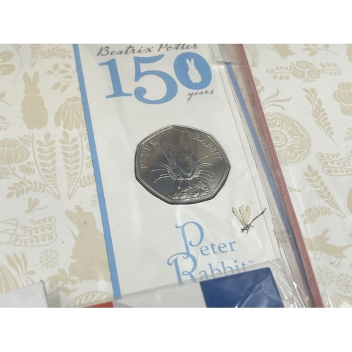 2213 - A collection of British coins to include three sealed The Royal Mint Beatrix Potter 150th Anniversar... 