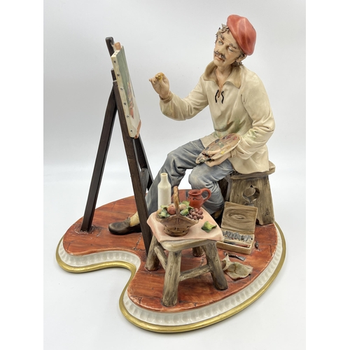 288 - A Capodimonte porcelain figurine of an artist painting a still life scene - approx. 29cm high