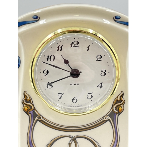 291 - A Mason's Art Nouveau porcelain mantel clock with quartz movement