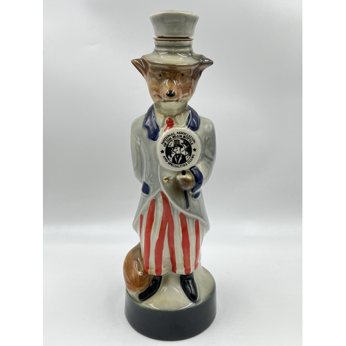 294 - A James Beam Distilling Co. Uncle Sam Fox porcelain whiskey decanter - approx. 32cm high