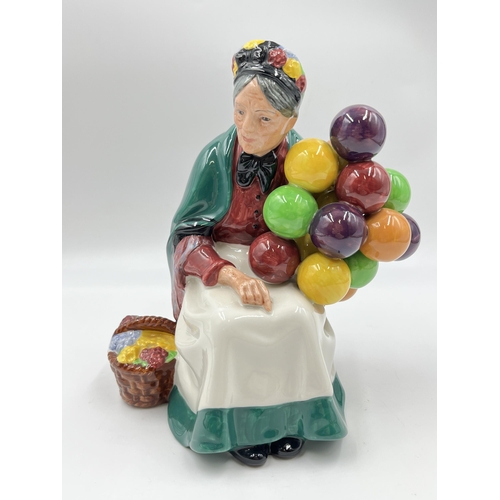 299 - A Royal Doulton The Old Balloon Seller figurine - HN 1315