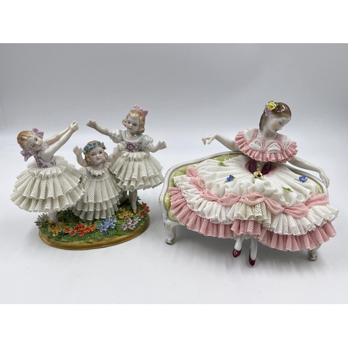 300 - Two German lace porcelain figurines, one Dresden seated ballerina and one Volkstedt