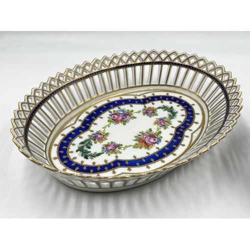 301 - Two Dresden hand painted and pierced porcelain baskets - largest approx. 6cm high x 25cm long x 18cm... 