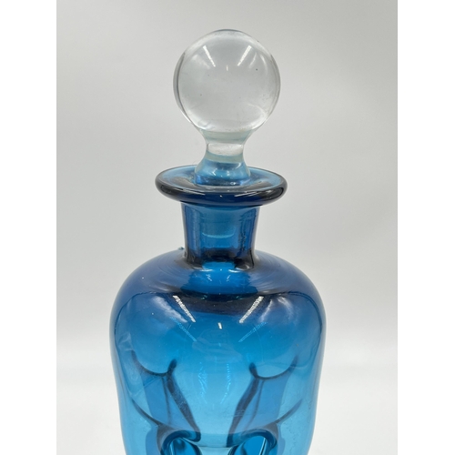 302 - A mid 20th century Holmegaard Kluk Kluk blue glass decanter - approx. 25cm high