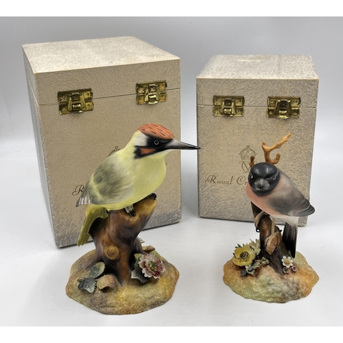 304 - Two boxed Royal Crown Derby bird figurines, one Green Woodpecker and one Bullfinch