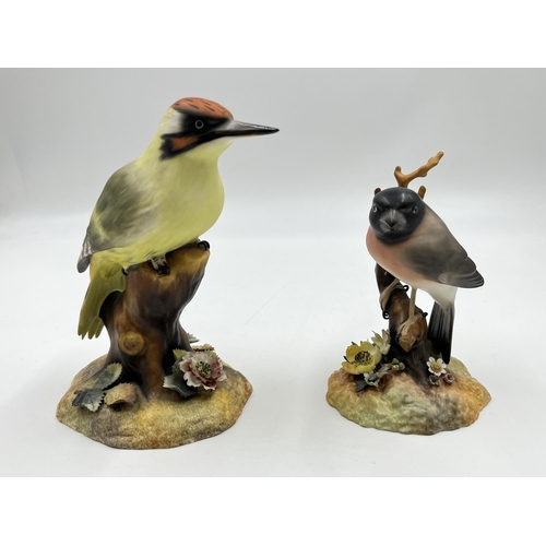 304 - Two boxed Royal Crown Derby bird figurines, one Green Woodpecker and one Bullfinch